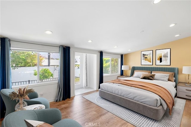 17211 Orozco St, Granada Hills, CA 91344 - bedroom featuring wood finished floors, access to outside, and recessed lighting
