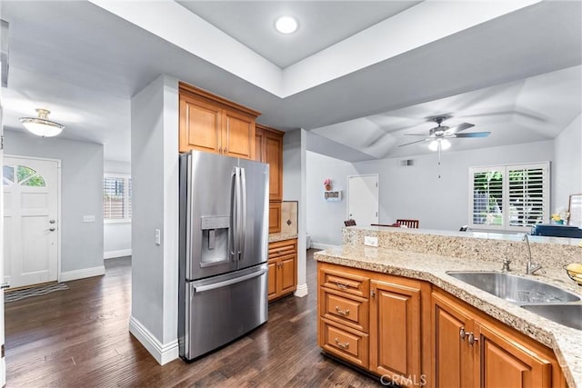 5742 E Hudson Bay Dr, Anaheim, CA 92807 - kitchen with stainless steel refrigerator with ice dispenser, a raised ceiling, ceiling fan, plenty of natural light, and recessed lighting