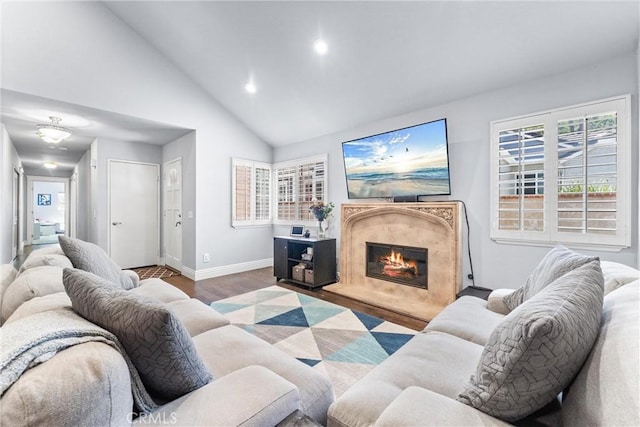 5742 E Hudson Bay Dr, Anaheim, CA 92807 - living room featuring wood finished floors, a high end fireplace, plenty of natural light, recessed lighting, and high vaulted ceiling