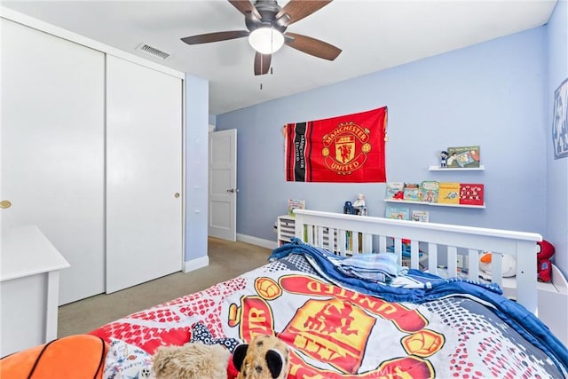 5742 E Hudson Bay Dr, Anaheim, CA 92807 - carpeted bedroom featuring a closet and ceiling fan