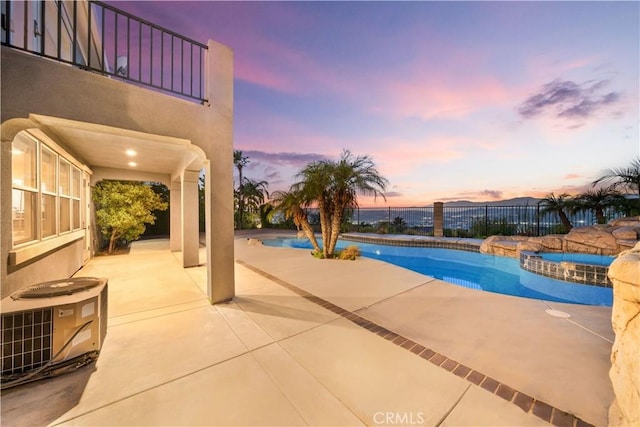 23735 Canyon Vista Ct, Diamond Bar, CA 91765 - pool at dusk with a patio and a pool with connected hot tub