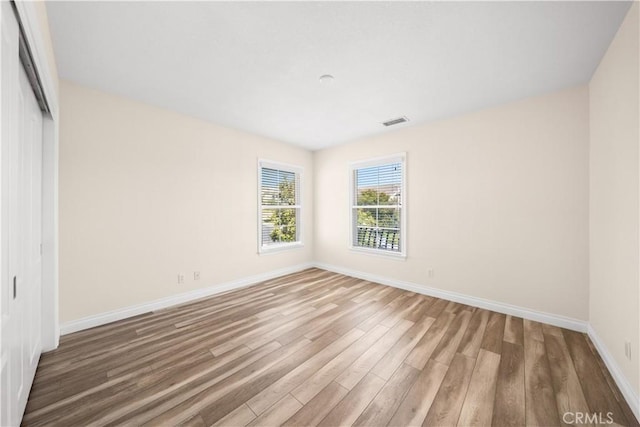 23735 Canyon Vista Ct, Diamond Bar, CA 91765 - unfurnished bedroom with wood finished floors and a closet