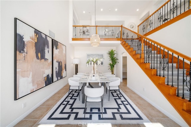 23735 Canyon Vista Ct, Diamond Bar, CA 91765 - tiled dining space with a towering ceiling, stairs, and recessed lighting