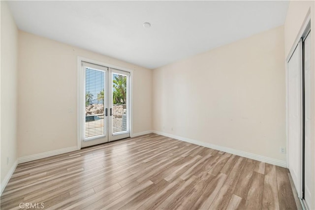 23735 Canyon Vista Ct, Diamond Bar, CA 91765 - empty room with light wood-style flooring and french doors