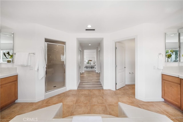 23735 Canyon Vista Ct, Diamond Bar, CA 91765 - full bath featuring vanity, healthy amount of natural light, a shower stall, tile patterned flooring, and recessed lighting