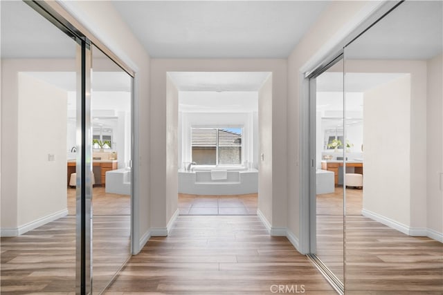 23735 Canyon Vista Ct, Diamond Bar, CA 91765 - corridor with light wood-type flooring and baseboards