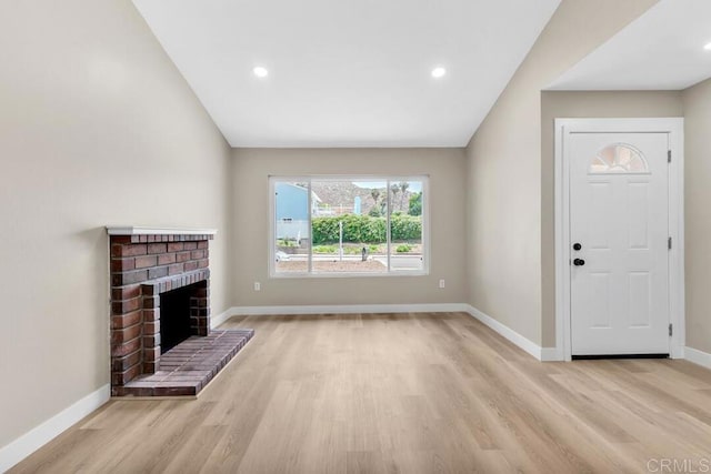10758 Princess Arlene Dr, Santee, CA 92071 - unfurnished living room featuring wood finished floors, a brick fireplace, and recessed lighting