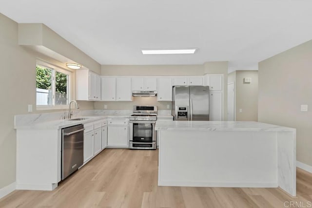 10758 Princess Arlene Dr, Santee, CA 92071 - kitchen featuring stainless steel appliances, light wood finished floors, and white cabinets
