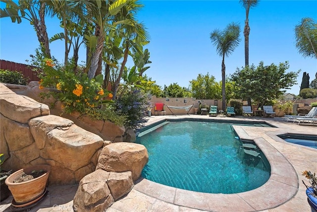 24481 Jutewood Pl, Lake Forest, CA 92630 - view of pool featuring an in-ground hot tub, a fenced backyard, and a patio area