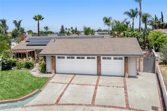 24481 Jutewood Pl, Lake Forest, CA 92630 - view of front of home with roof with shingles, roof mounted solar panels, driveway, and a garage