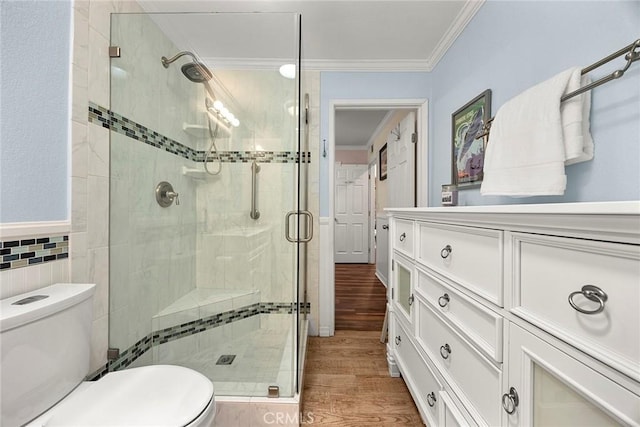 24481 Jutewood Pl, Lake Forest, CA 92630 - full bathroom with ornamental molding, a shower stall, wood finished floors, tile walls, and vanity