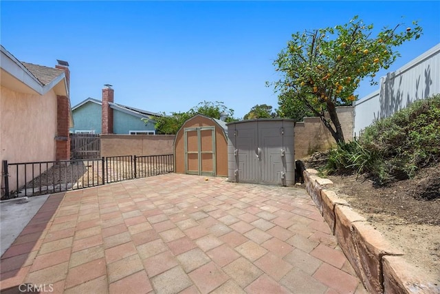 24481 Jutewood Pl, Lake Forest, CA 92630 - fenced backyard featuring a storage unit and a patio