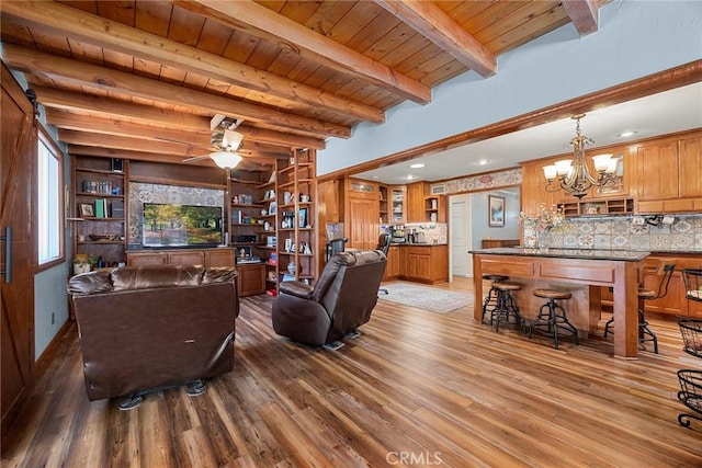 24481 Jutewood Pl, Lake Forest, CA 92630 - living area featuring light wood finished floors, a chandelier, recessed lighting, a ceiling fan, and a wood ceiling with exposed beams