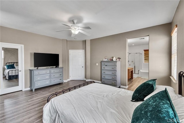 296 Lady Bell Way, Perris, CA 92571 - bedroom with wood finished floors, a ceiling fan, and ensuite bathroom