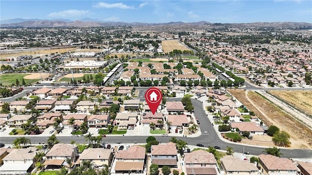 296 Lady Bell Way, Perris, CA 92571 - aerial view of property and surrounding area featuring mountains and nearby suburban area