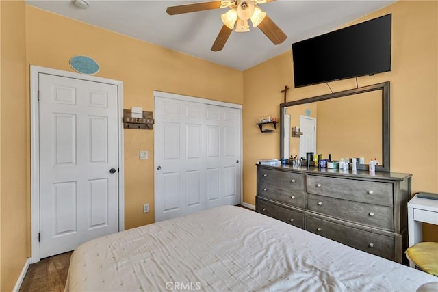 296 Lady Bell Way, Perris, CA 92571 - carpeted bedroom with a closet and a ceiling fan