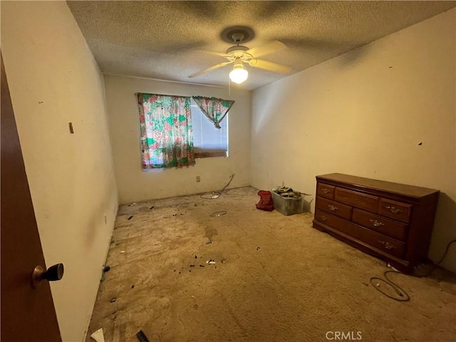 3917 Wood Ln, Bakersfield, CA 93309 - unfurnished bedroom with a textured ceiling and ceiling fan