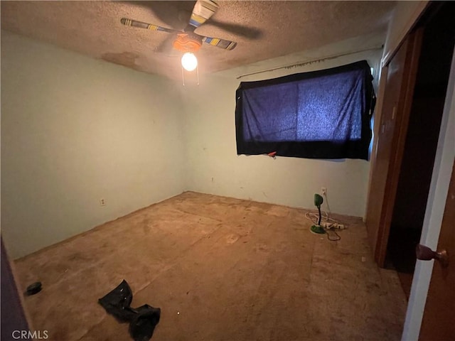 3917 Wood Ln, Bakersfield, CA 93309 - unfurnished bedroom with a textured ceiling, carpet, and a ceiling fan