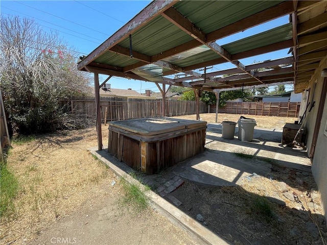 3917 Wood Ln, Bakersfield, CA 93309 - fenced backyard featuring a hot tub and a patio area