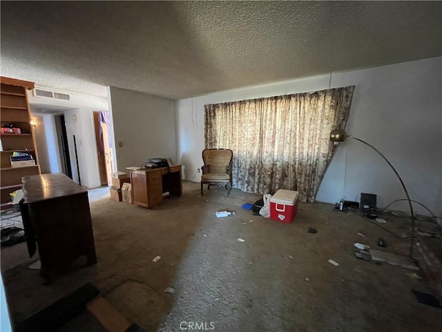3917 Wood Ln, Bakersfield, CA 93309 - carpeted living area featuring a textured ceiling