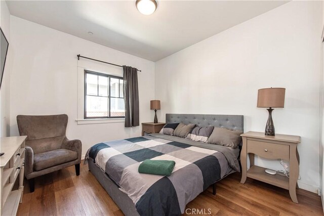 5336 Lemon Grove Ave, Los Angeles, CA 90038 - bedroom with wood finished floors and baseboards