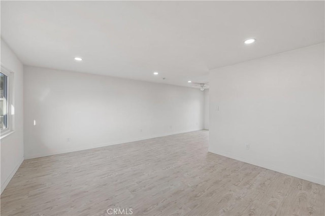1534 Richfield Ave, Rosamond, CA 93560 - empty room with light wood-style flooring and recessed lighting