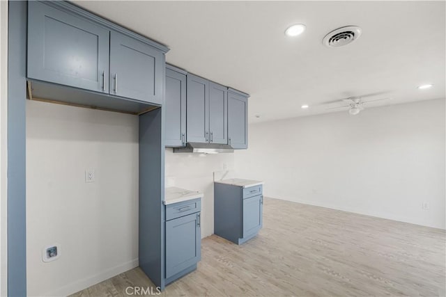 1534 Richfield Ave, Rosamond, CA 93560 - below grade area with light wood-style floors, a ceiling fan, and recessed lighting