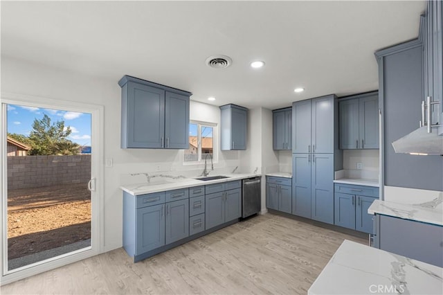 1534 Richfield Ave, Rosamond, CA 93560 - kitchen featuring light wood finished floors, light stone counters, recessed lighting, and stainless steel dishwasher
