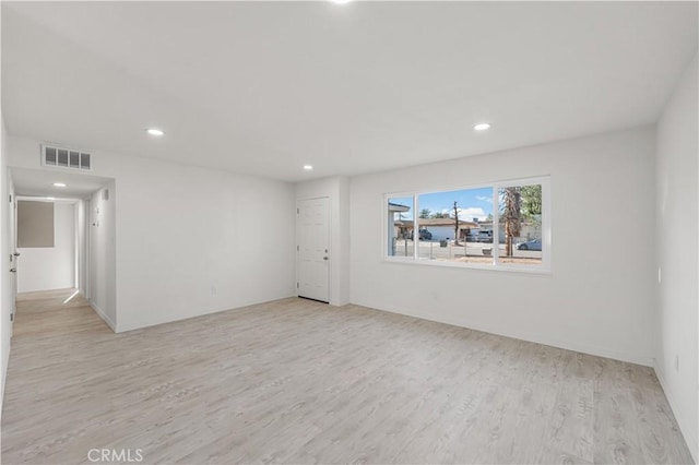 1534 Richfield Ave, Rosamond, CA 93560 - empty room with light wood finished floors and recessed lighting
