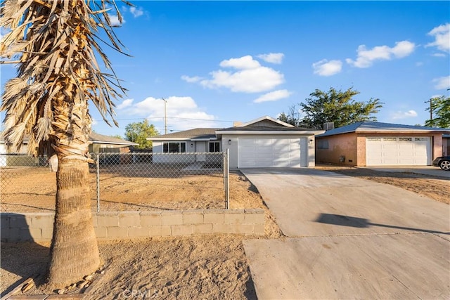 1534 Richfield Ave, Rosamond, CA 93560 - ranch-style home featuring driveway, stucco siding, and a garage