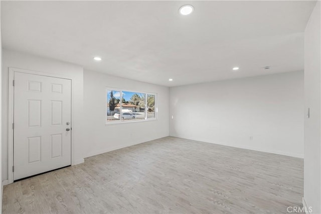 1534 Richfield Ave, Rosamond, CA 93560 - spare room featuring wood finished floors and recessed lighting
