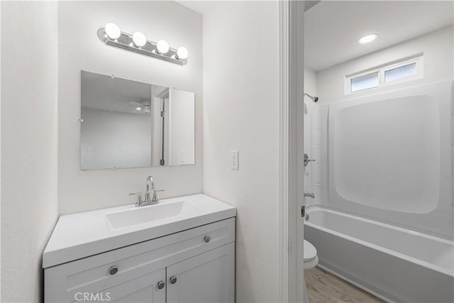 1534 Richfield Ave, Rosamond, CA 93560 - bathroom with vanity, shower / bathtub combination, and wood finished floors