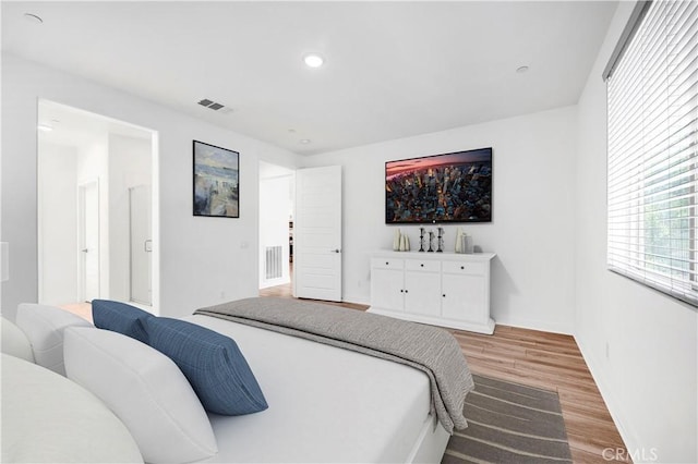 1660 Capri Way, Beaumont, CA 92223 - bedroom with wood finished floors and recessed lighting