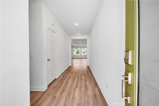 1660 Capri Way, Beaumont, CA 92223 - corridor with light wood-style flooring and recessed lighting