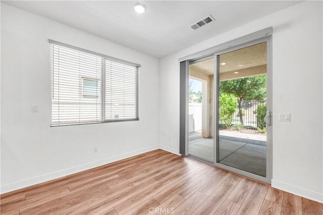 1660 Capri Way, Beaumont, CA 92223 - empty room featuring light wood finished floors, plenty of natural light, and recessed lighting