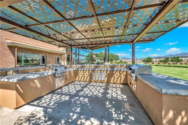 1660 Capri Way, Beaumont, CA 92223 - view of patio featuring area for grilling and a mountain view
