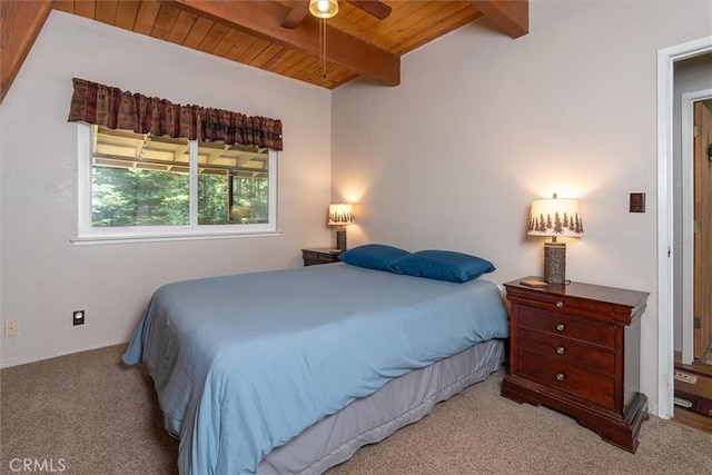 52926 Balsam Dr, Oakhurst, CA 93644 - carpeted bedroom featuring a wood ceiling with exposed beams