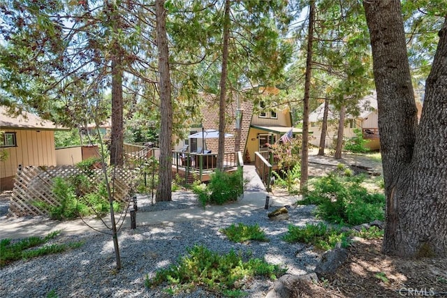 52926 Balsam Dr, Oakhurst, CA 93644 - view of yard featuring a deck