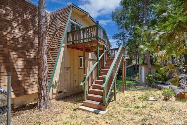 52926 Balsam Dr, Oakhurst, CA 93644 - view of play area featuring stairs and a deck