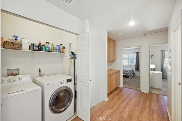 8554 Burnet Ave Unit 144, North Hills, CA 91343 - laundry room with separate washer and dryer and light wood-style floors