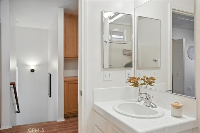 8554 Burnet Ave Unit 144, North Hills, CA 91343 - bathroom featuring vanity and wood finished floors