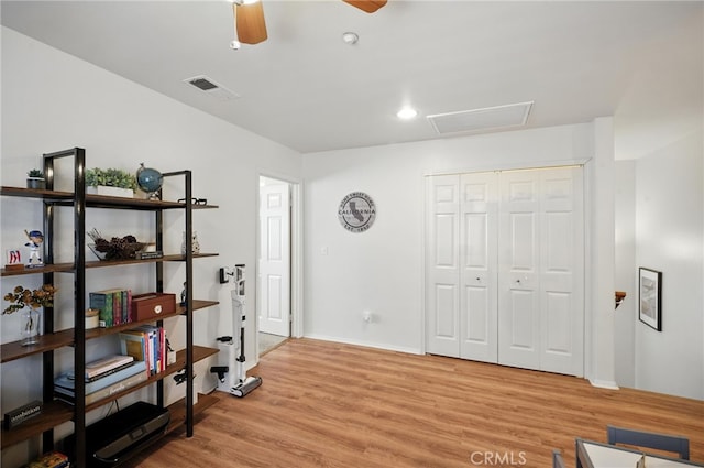 8554 Burnet Ave Unit 144, North Hills, CA 91343 - office featuring light wood-style flooring, attic access, and a ceiling fan
