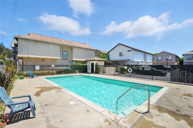 8554 Burnet Ave Unit 144, North Hills, CA 91343 - community pool featuring a patio and a residential view