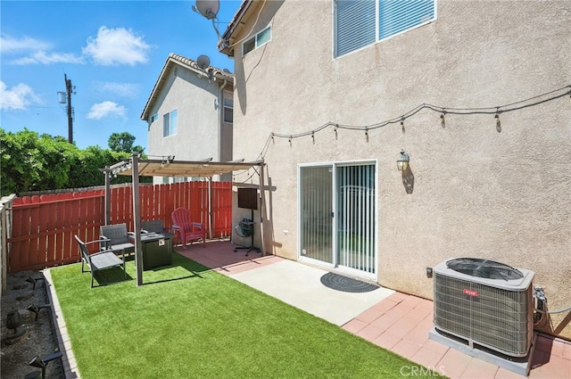 8554 Burnet Ave Unit 144, North Hills, CA 91343 - rear view of property featuring stucco siding, a pergola, and a patio