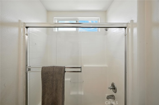 8554 Burnet Ave Unit 144, North Hills, CA 91343 - bathroom with enclosed tub / shower combo and a textured wall