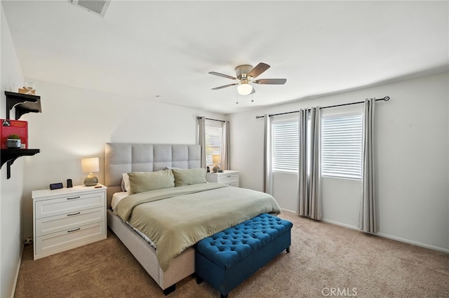 8554 Burnet Ave Unit 144, North Hills, CA 91343 - bedroom with light colored carpet and ceiling fan