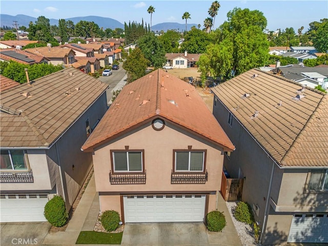 8554 Burnet Ave Unit 144, North Hills, CA 91343 - aerial view of residential area featuring a mountainous background