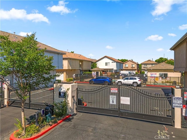 8554 Burnet Ave Unit 144, North Hills, CA 91343 - gate with a residential view