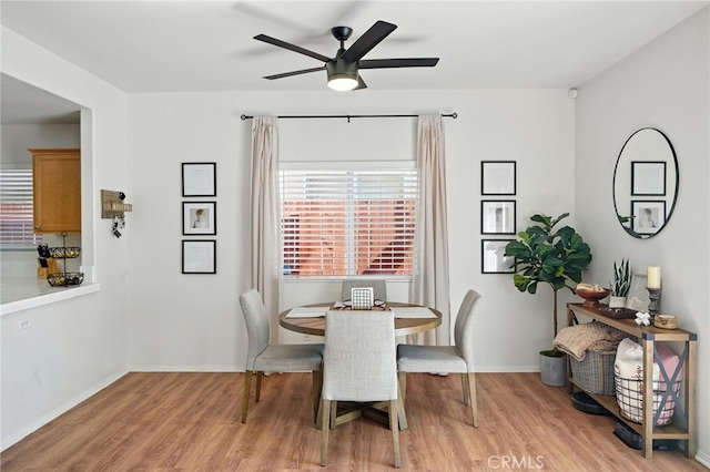 8554 Burnet Ave Unit 144, North Hills, CA 91343 - dining room featuring light wood finished floors and ceiling fan
