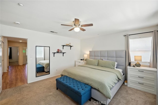 8554 Burnet Ave Unit 144, North Hills, CA 91343 - bedroom featuring light carpet and ceiling fan